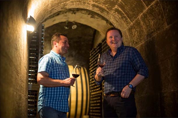 Tom Laithwaite and winemaker Fernando talk shirt patterns – you can catch a glimpse of Primicia’s elevator-sized barrel shape in the background