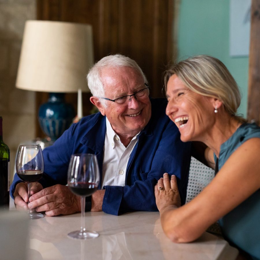 Tony and Brigitte enjoy a glass of wine during a recent visit to Chateau Guibeau